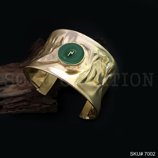 Gold Plated Hammered Design of Cuff With Green Power sign  SKU7002